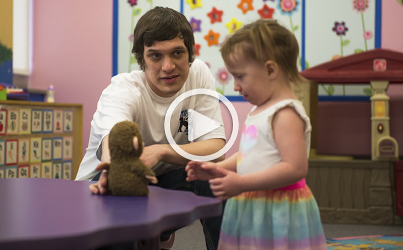 A photo of Myke and his daughter.