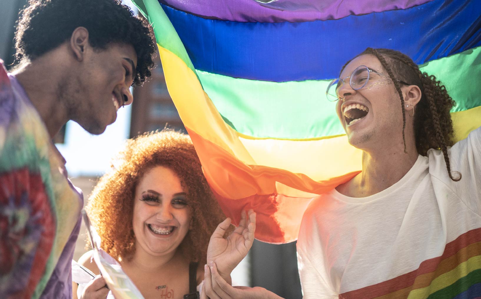 UWEO-Blog-CPride-OpEd_NewsCover-EN People celebrating Pride