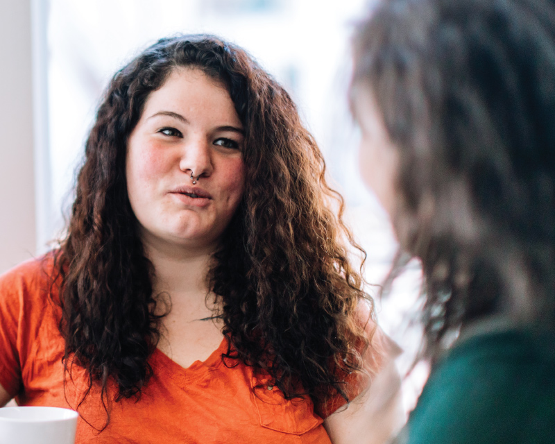 A photo of someone talking to a councilor.